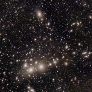 A myriad of stars and galaxies floating in space.