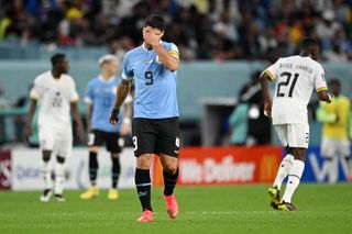 Uruguay's Luis Suarez gestures during his side's 2-0 win over Ghana, which was ultimately not enough to see the South American team make it through to the last 16 of the 2022 World Cup.