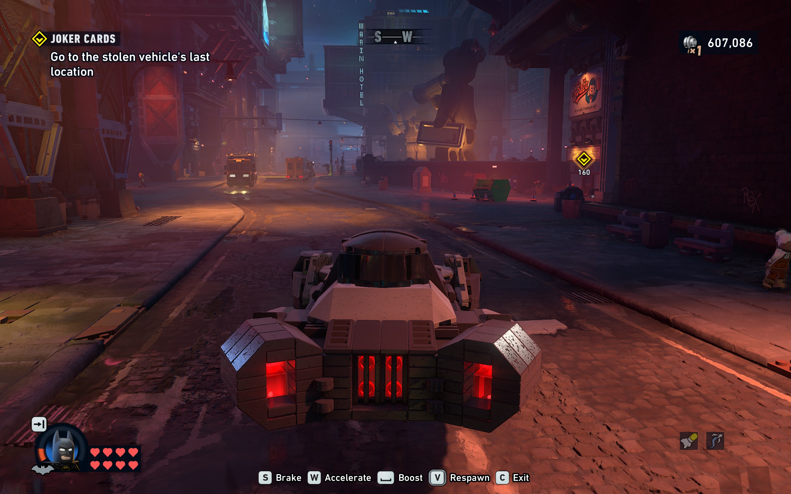The Batmobile cruises through Gotham City