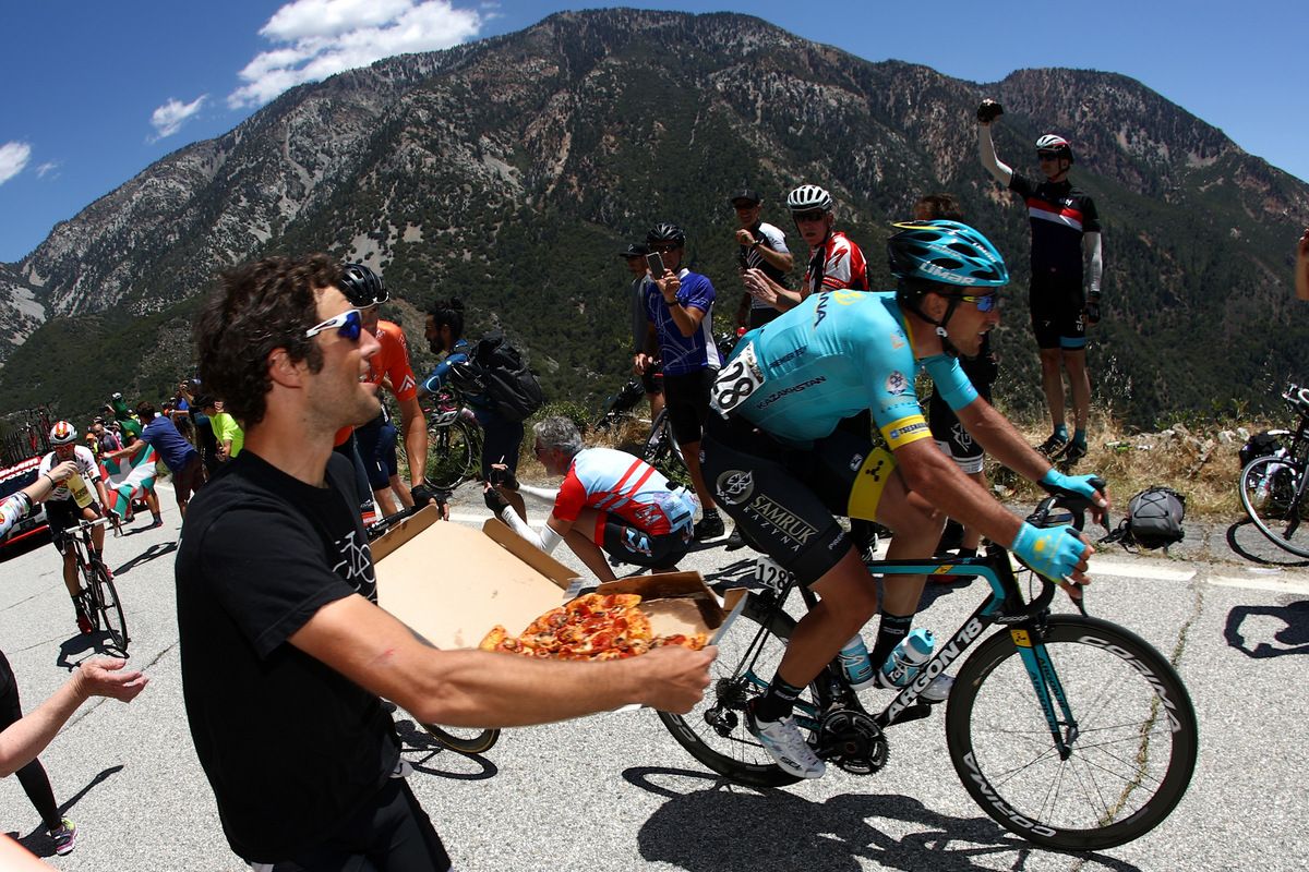 Astana's Artyom Zakharov declines a slice of Pizza on Mt Baldy