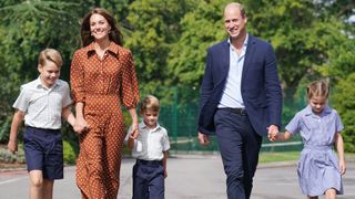 The Prince and Princess of Wales smile as they accompany Prince George, Charlotte and Louis to a settling-in afternoon at Lambrook School