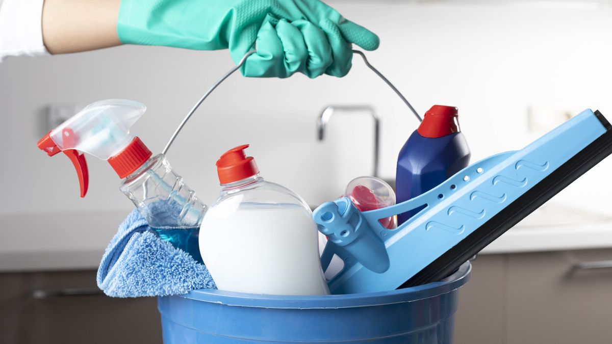 A bucket filled with cleaning equipment