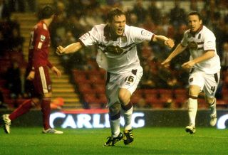 Northampton Town's Northern Irish forward Billy McKay scores the equalising goal against Liverpool in their English Football League football match against Northampton Town at Anfield in Liverpool, north-west England, on September 22, 2009. Northampton won after extra time and penalties. AFP PHOTO/PAUL ELLIS (Photo credit should read PAUL ELLIS/AFP via Getty Images)