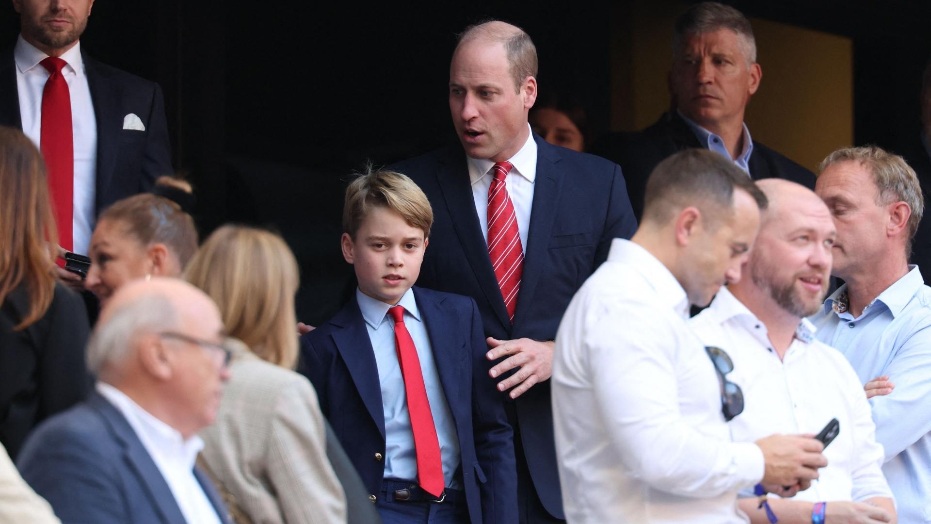 Patron of the Welsh Rugby Union Britain's Prince William, Prince of Wales (CR) guides his son Prince George of Wales (CL) during the France 2023 Rugby World Cup quarter-final match between Wales and Argentina at the Stade Velodrome in Marseille, south-eastern France, on October 14, 2023.