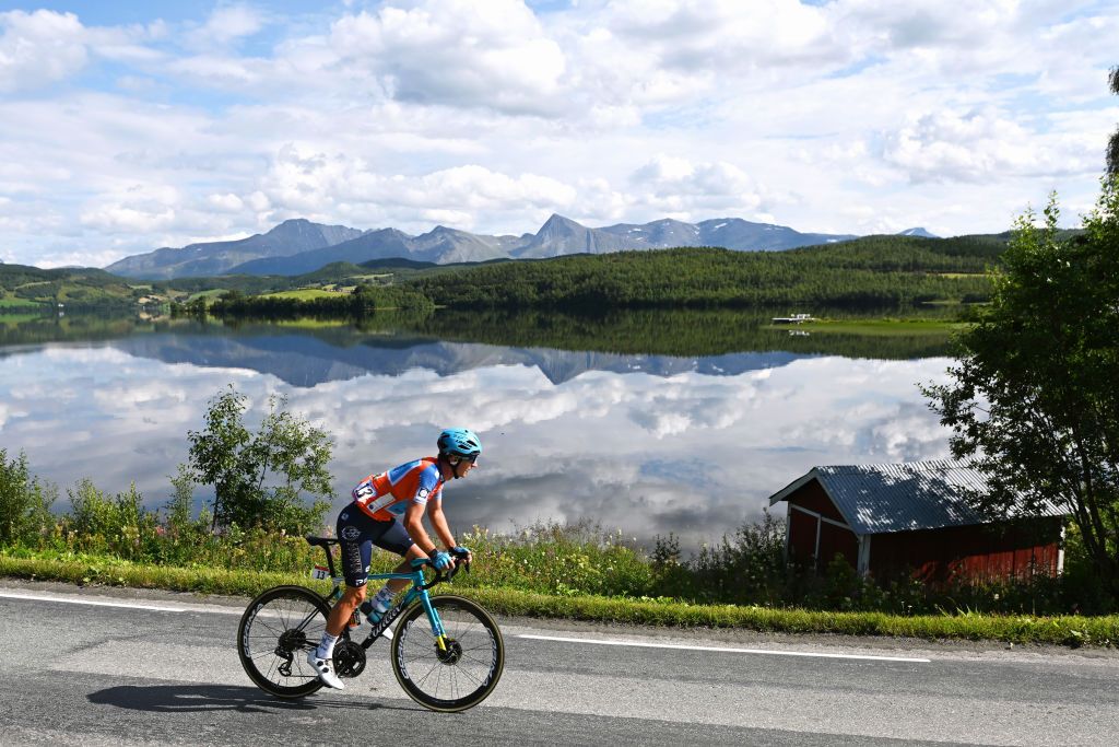 KILPISJARVI FINLAND AUGUST 06 Gleb Brussenskiy of Kazahkstan and Team Astana Premier Tech Salmon Mountain Jersey during the 8th Arctic Race Of Norway 2021 Stage 2 a 178km stage from Nordkjosbotn to Storfjord Kilpisjrvi Finland ArcticRace on August 06 2021 in Kilpisjarvi Finland Photo by Stuart FranklinGetty Images