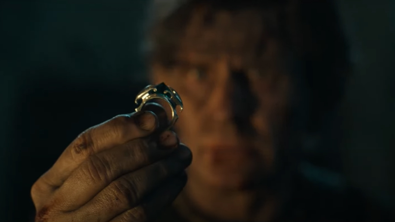 Celebrimbor holds up one of the new titular rings  in The Rings of Power season 2