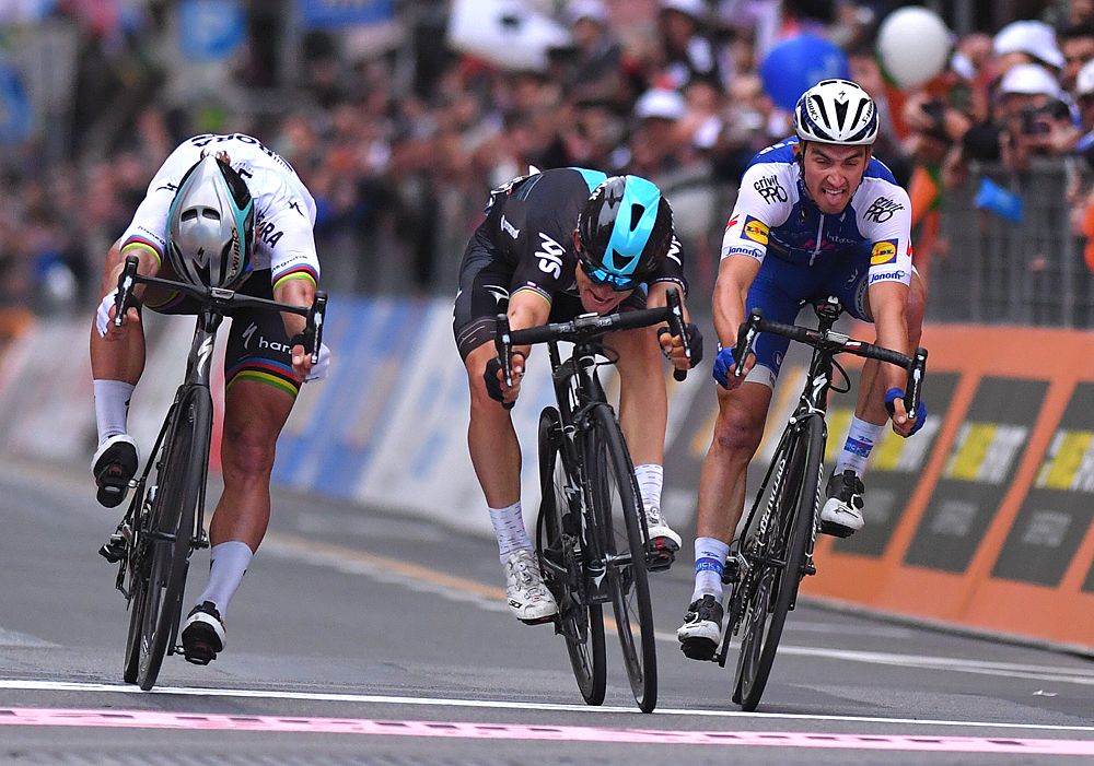 Michal Kwiatkowski (Team Sky) wins Milan-San Remo on a bike throw