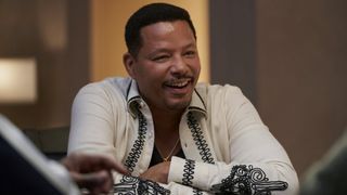 Terrence Howard as Quentin laughing at a poker table in The Best Man: The Final Chapters