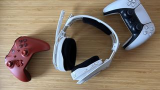 Astro A50 X headset with PS5 and Xbox controllers