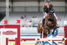 Chris Burton riding Chedington Azzurra to victory at the LGCT London