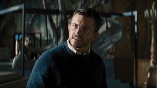 Jonathan Bailey looking confused in a museum during Jurassic World: Rebirth's trailer