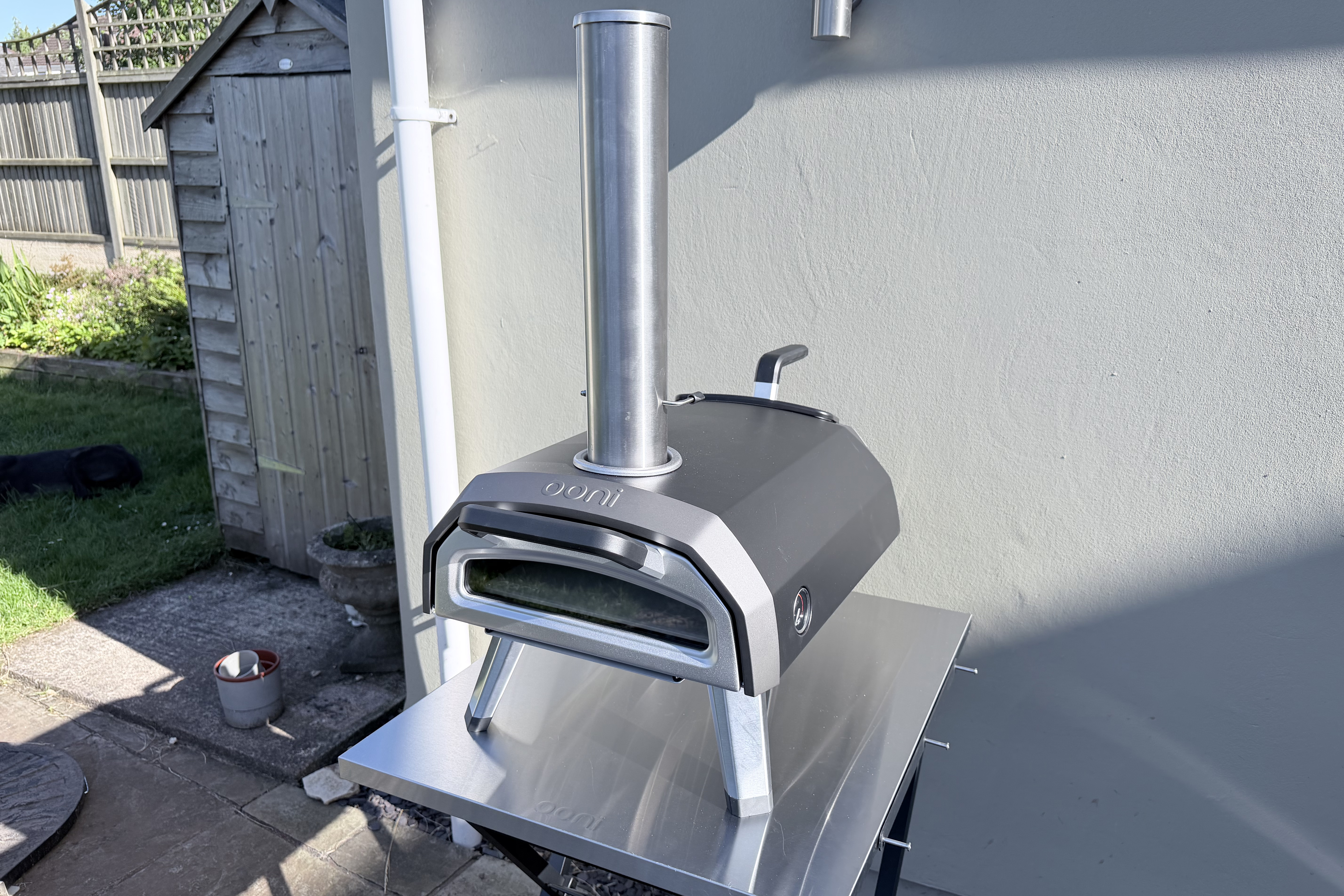The Ooni Karu 2 assembled on a patio and metal table