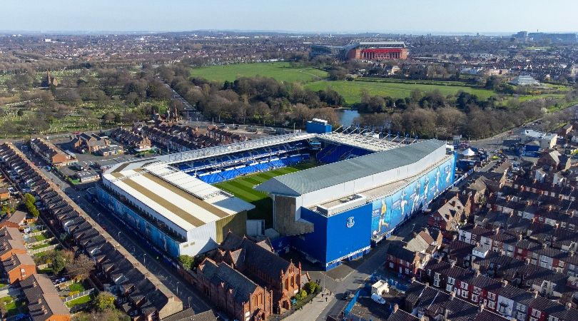 An aerial view of Everton&#039;s Goodison Park home in April 2023, with Liverpool&#039;s Anfield stadium across Stanley Park in the background.