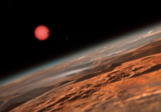 This artist's impression shows one potential view of the TRAPPIST-1 star system as seen from near one of the three alien planets circling the ultracool dwarf star. The three planets are the first ever found around such a tiny and dim star.