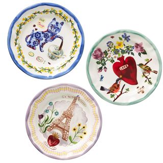 A trio of painted funky dinner plates