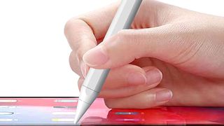 A photo of a person using an Apple Pencil 2
