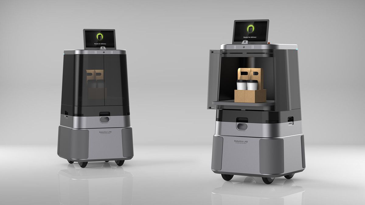 Two Hyundai DAL-e Robots carrying coffee, in a grey room