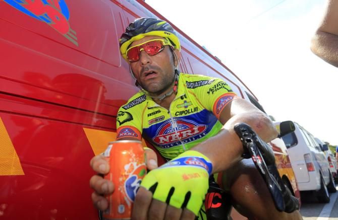 Francesco Chicchi (Yellow Fluo) recovers after another hot day of racing at the Tour de Langkawi