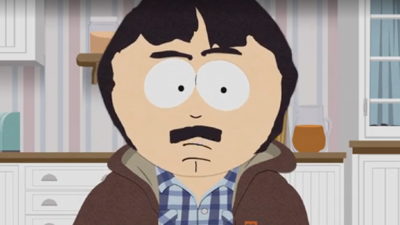 Randy sitting at his dinner table in South Park.