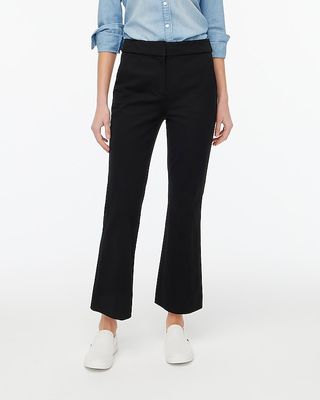 A model wearing J.Crew's black Kelsey Flare Pant