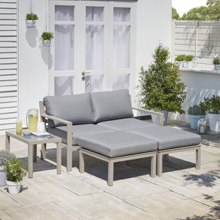 grey day bed from George Home on patio