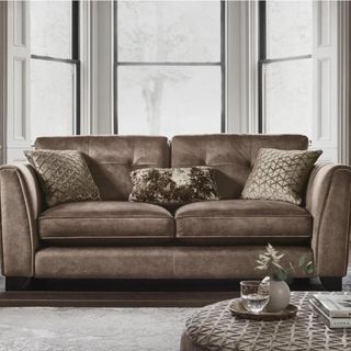 brown sofa in a neutral living room