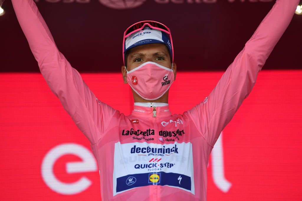 VIESTE ITALY OCTOBER 10 Podium Joao Almeida of Portugal and Team Deceuninck QuickStep Pink Leader Jersey Celebration Mask Covid Safety Measures during the 103rd Giro dItalia 2020 Stage Eight a 200km stage from Giovinazzo to ViesteGargano girodiitalia Giro on October 10 2020 in Vieste Italy Photo by Tim de WaeleGetty Images