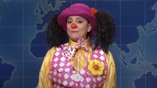 Goober the Clown (Cecily Strong) speaks on Saturday Night Live's Weekend Update