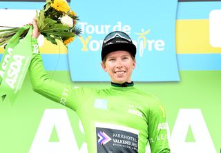 Lorena Wiebes of Team Parkhotel Valkenburg on the podium in the green jersey for best sprinter classification.