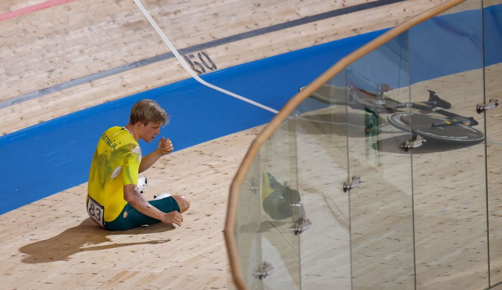 Australias Alexander Porter reacts after crashing during the mens track cycling team pursuit qualifying event during the Tokyo 2020 Olympic Games at Izu Velodrome in Izu Japan on August 2 2021 Photo by Odd ANDERSEN AFP Photo by ODD ANDERSENAFP via Getty Images