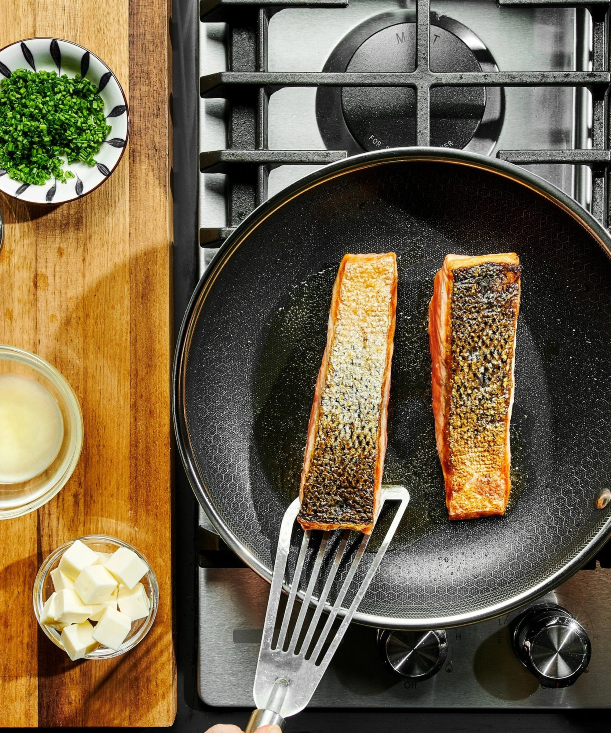 HexClad Hybrid Pan searing skin-on salmon