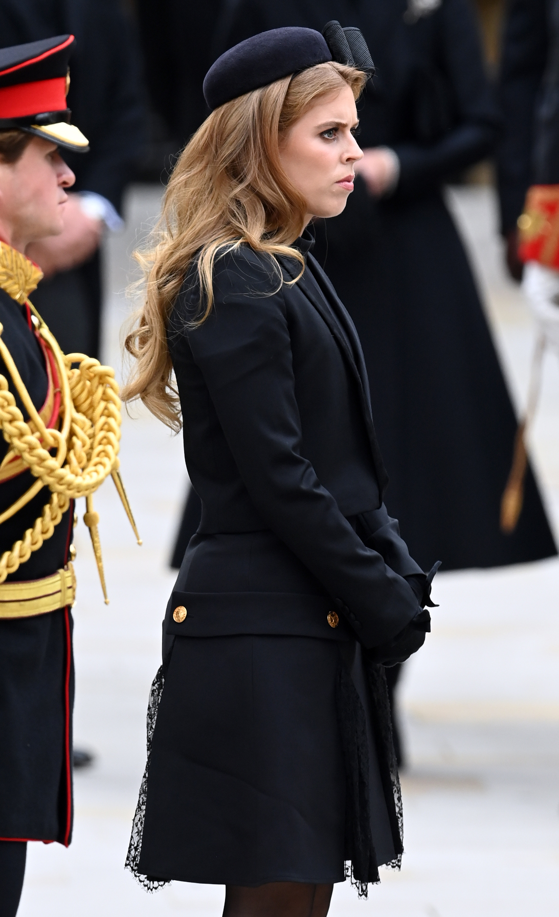 Princess Beatrice standing at Queen Elizabeth's funeral