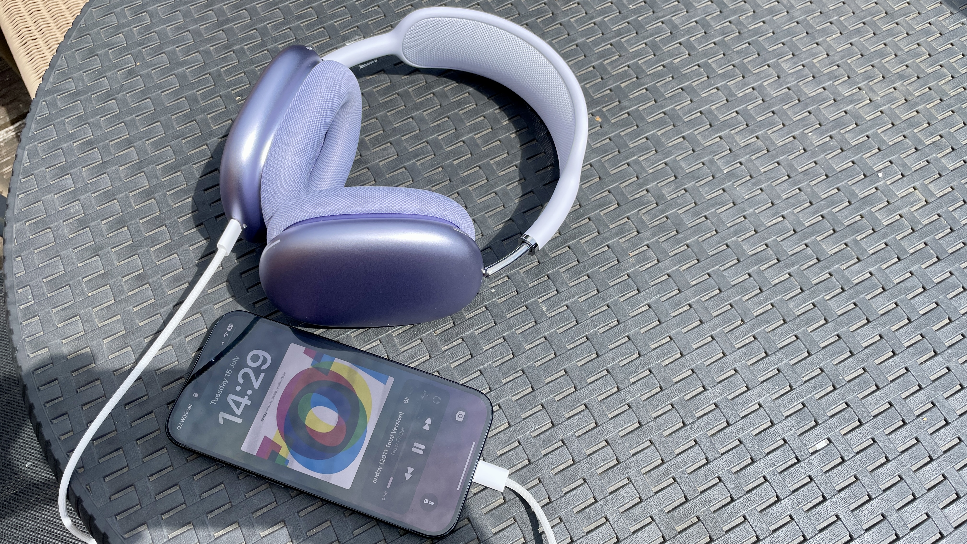 AirPods Max in purple hooked up to a source via USB-C
