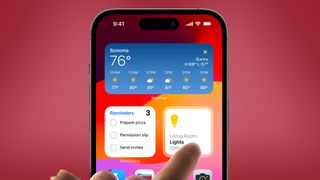 A finger tapping an interactive widget in iOS 17