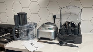 Sage the Kitchen Wizz 15 Pro with all its components spread out on a cpountertop