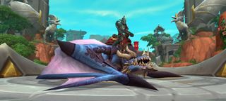 World of Warcraft: Dragonflight - A player in armor sits on top of a drake mount