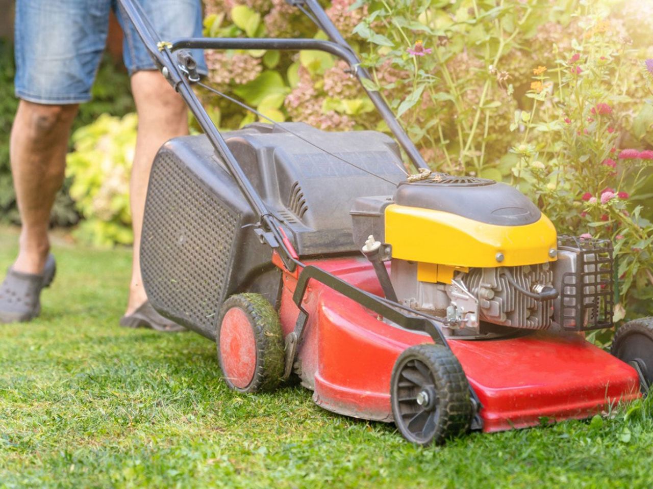 Person mowing The Lawn