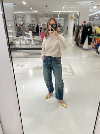 Sandy Kozsarek wears gold slingback heels