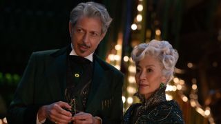 Jeff Goldblum and Michelle Yeoh look on with slightly villainous looks in Wicked.