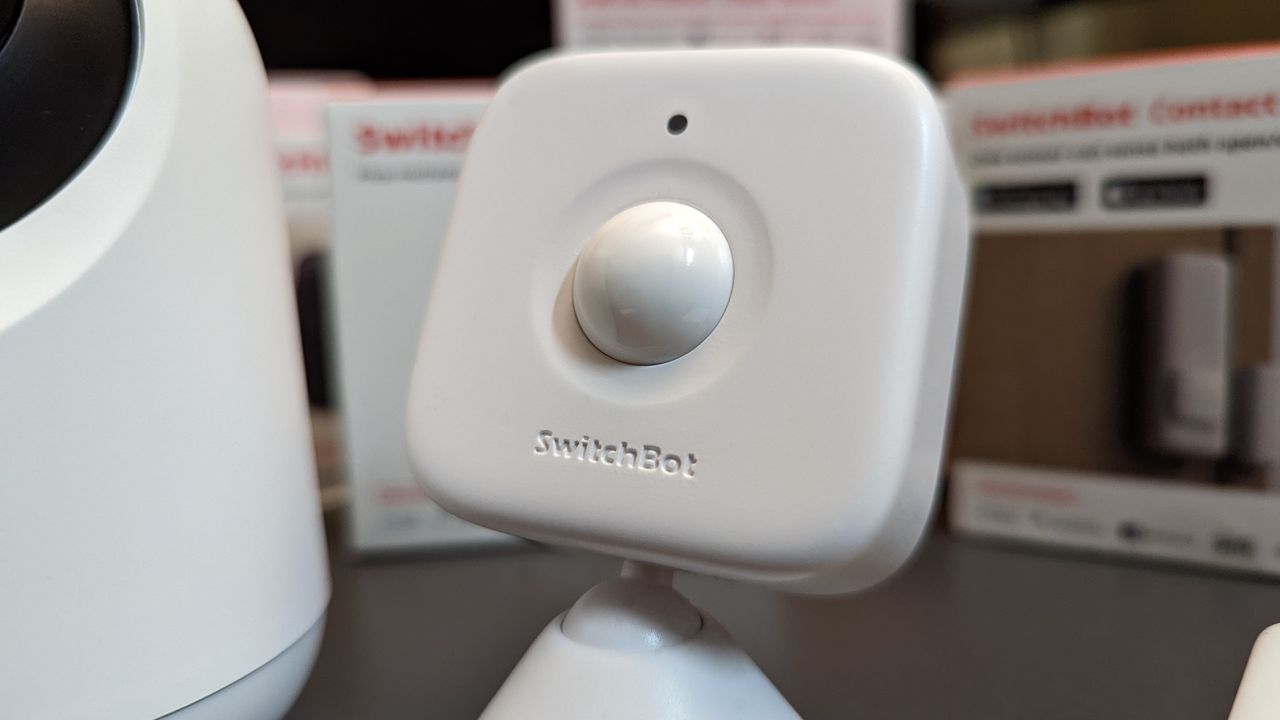 SwitchBot smart motion sensor on a table