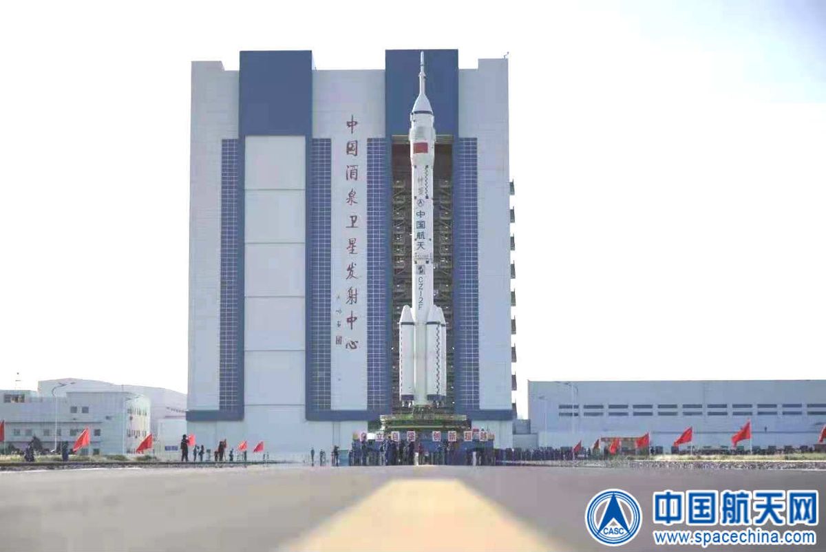 China&#039;s Shenzhou 12 spacecraft and its Long March 2F rocket roll out to the launch pad on June 9, 2021.