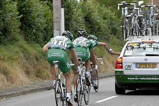 Hushovd gets some help while going back to the team car.
