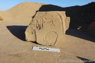 Near the sphinx, archaeologists found hundreds of hieroglyphic fragments that once belonged to a shrine to the pharaoh Amenhotep III.