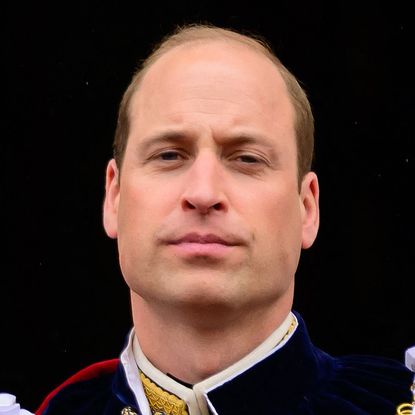 Prince William stares at the camera