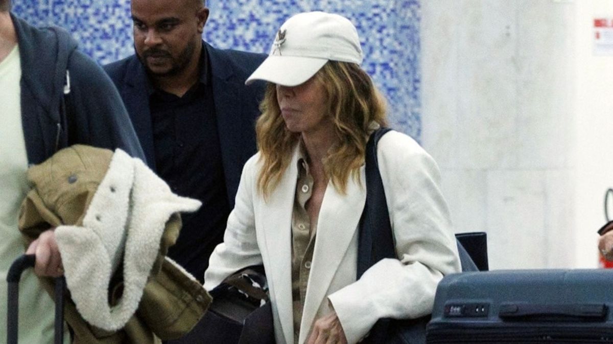 Spotted at the Airport: How Chic French Women Over-50 Are Styling Jeans and Trainers Now