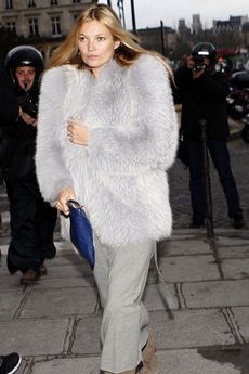Kate Moss wearing a fur coat out and about in Paris