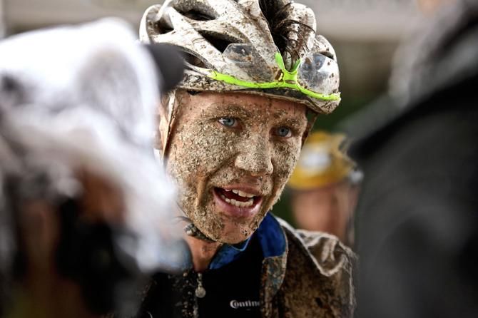 A muddy racer after the finish