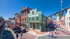 eesburg, Virginia, USA, October 6, 2025 Car enthusiasts stroll through vintage vehicle showcase in historic Leesburg, Virginia