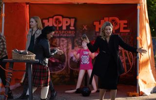 Moira Dingle wearing a kilt as Charity Dingle throws a haggis at her hen do