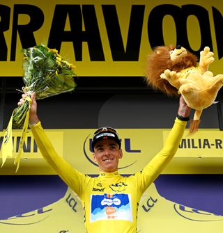 Tour de France: Romain Bardet of France and Team dsmfirmenich PostNL celebrates at podium as Yellow Leader Jersey winner during the 111th Tour de France 2024 Stage 1 a 206km stage from Firenze to Rimini UCIWT on June 29 2024 in Rimini Italy Photo by Dario BelingheriGetty Images